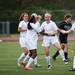 Skyline senior Carmen Flesher celebrates with her team after scoring the second goal during the game against Huron on Thursday, May 30. Daniel Brenner I AnnArbor.com